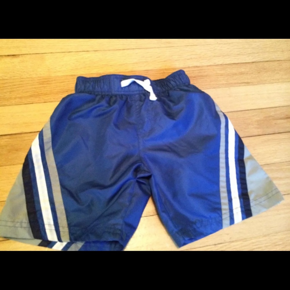 2T French Toast boy swim trunks worn once.